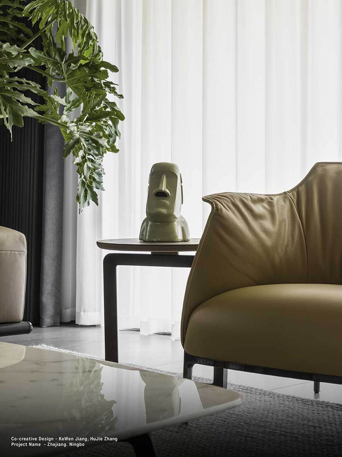 Close view of the leather folds and stitching on an Archibald chair