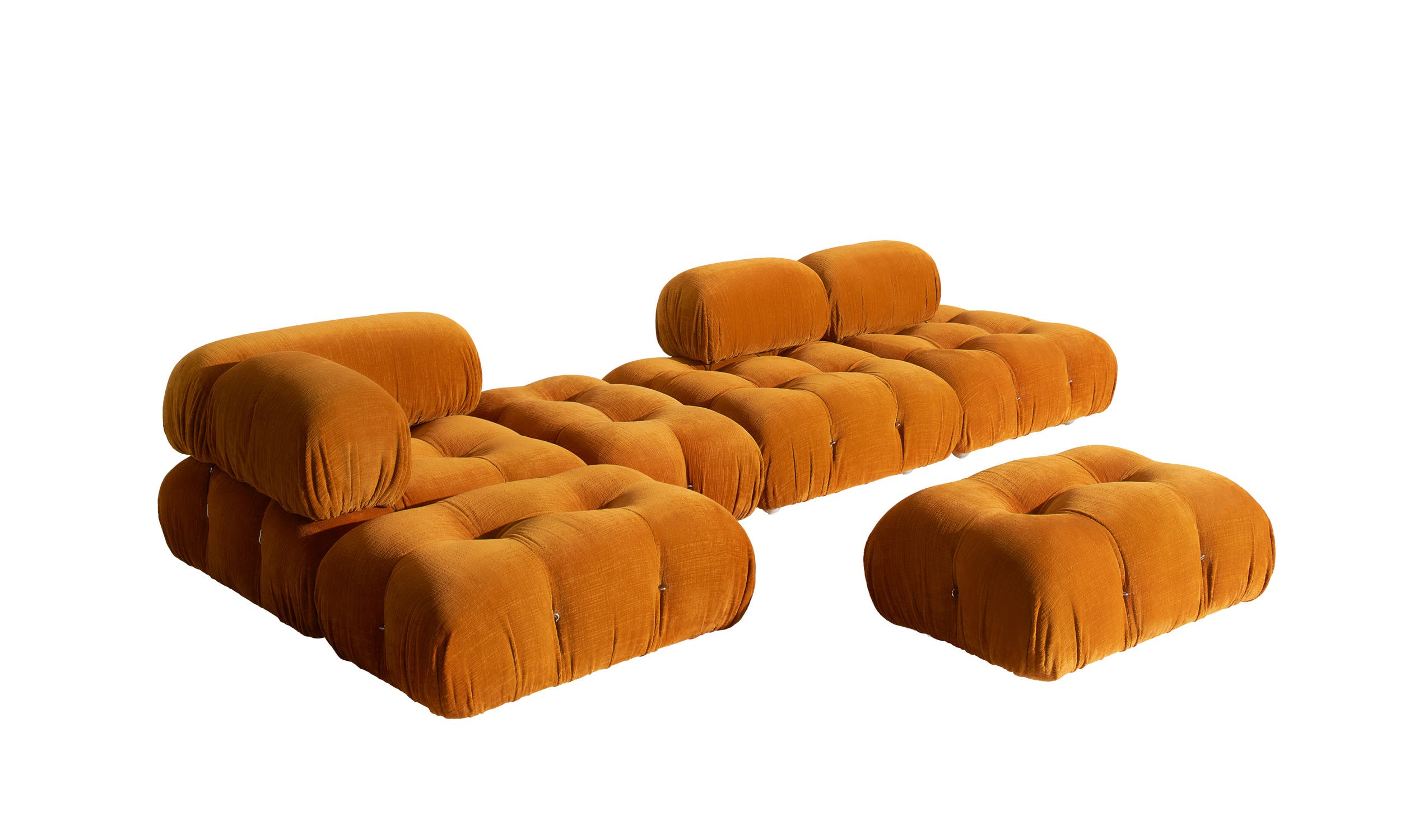 Orange Camaleonda modular sofa shown as an island composition